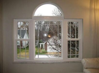 arched window with white trim in fenton, mo