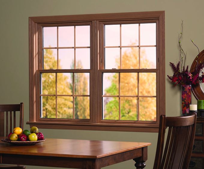 wooden-framed double window above a dining table