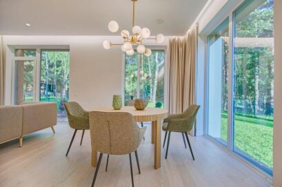 modern dining room with large glass windows in Fenton, MO
